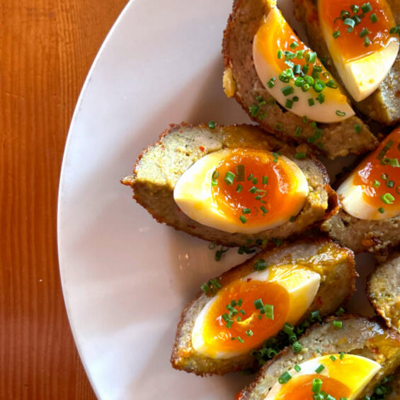 Delicious scotch eggs served at Swans Pub in Victoria, BC during Happy Hour 3-6pm - a perfect pub snack with a crispy exterior and savory center